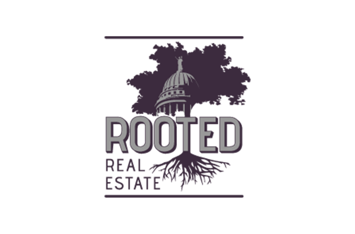 Rooted Real Estate with tree and roots image with capitol silhouette